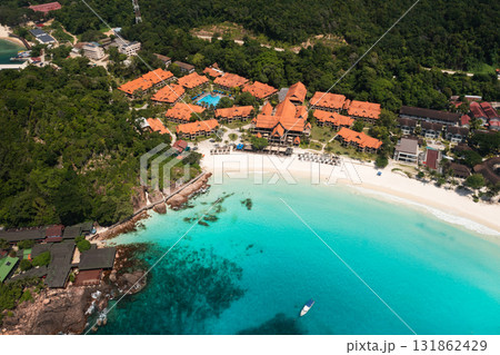 Beautiful tropical Long Beach on Redang Island in Malaysia with clear turquoise waters and jungle under sunny skies in the coastal resort area 131862429