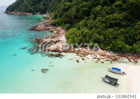 View of the tropical beach on Redang Island. Turtle beach with tourists and boats on Redang Island in Malaysia 131862542