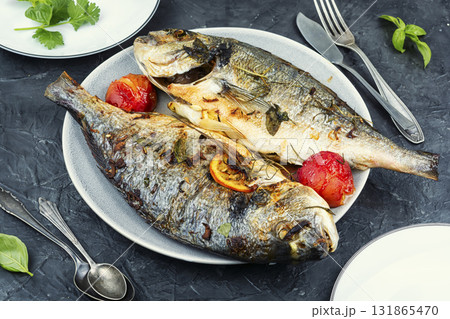 Grilled dorado fish with plums. Grilled dorado fish with plums. 131865470