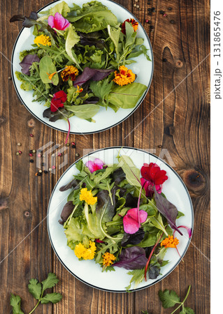 Refreshing salad with greens of floral garnish Refreshing salad with greens of floral garnish 131865476