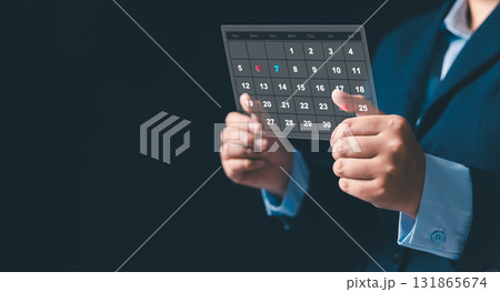 Using digital technology, business set strategic agenda by managing appointment, scheduling project task, organizing timeline, date, deadlines calendar to ensure effective time, project management. 131865674