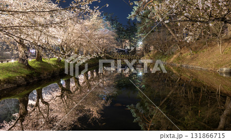 the reflection of river and pond around the Hirosaki park, the sakura tree during Hirosaki Cherry Blossom Festival at night the reflection of river and pond around the Hirosaki park, the sakura tree during Hirosaki Cherry Blossom Festival at night 131866715