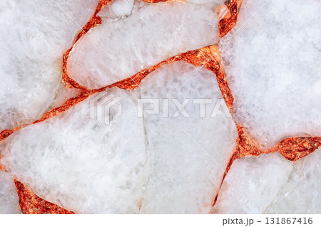 Agate Crystal White stone texture with a copper leaf as part of unique interior. Agate Crystal White stone texture with a copper leaf as part of unique interior. 131867416