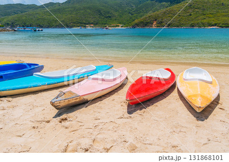 Kayaks on sandy beach by the sea in the lagoon in summer on vacation Kayaks on sandy beach by the sea in the lagoon in summer on vacation 131868101