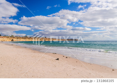Scenic coastline at Port Willunga with turquoise water and white clouds Scenic coastline at Port Willunga with turquoise water and white clouds 131868105