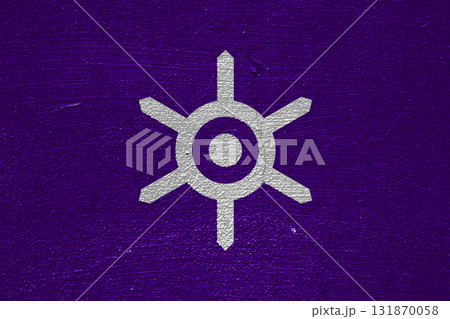 The official flag of Tokyo, the capital of Japan, on a cracked wall texture. Conceptual collage 131870058