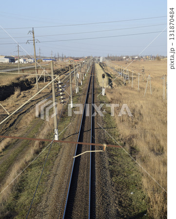 Plot railway. Top view on the rails. High-voltage power lines for electric trains 131870484