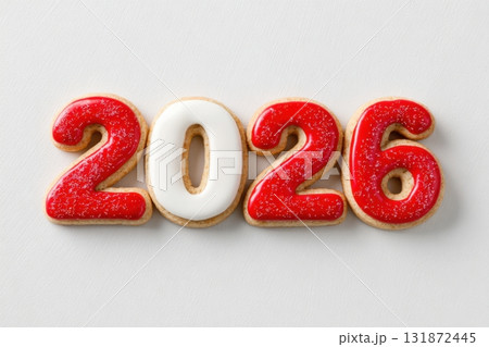 Numbers 2026 from Christmas glazed red white cookies on a white background. Decorative Gingerbread Holiday Composition for Merry Christmas and Happy New Year Celebration. Cake, spice-cake figures 2026 131872445