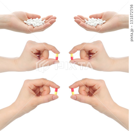 Set of hands holding pills, isolated on transparent background Set of hands holding pills, isolated on transparent background 131872556