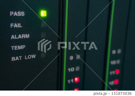 Green light is lit up on a black box that says PASS Green light is lit up on a black box that says PASS 131873036