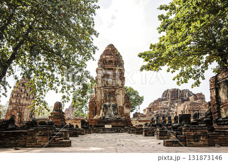 Large building with a statue of Buddha in the middle Large building with a statue of Buddha in the middle 131873146