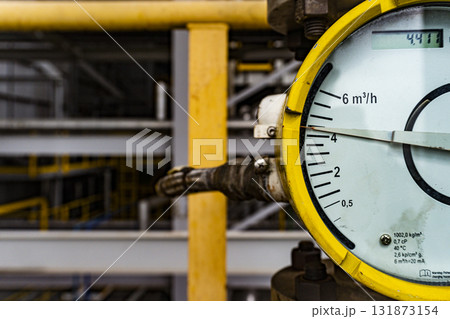 Yellow and white gauge with a 6 on it 131873154