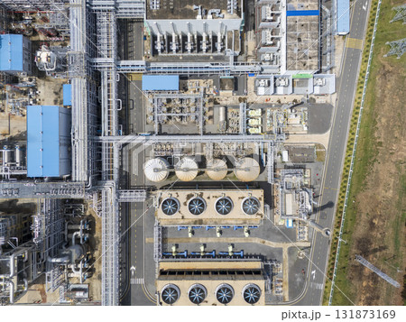 Large industrial plant with many tanks and pipes 131873169