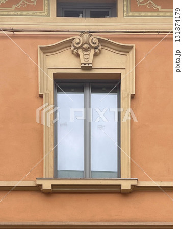 Traditional window of Italian buildigns with closing doors in wood Traditional window of Italian buildigns with closing doors in wood 131874179