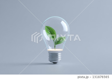 Glowing lightbulb with green leaf inside, symbolizing eco friendly energy, sustainability, innovation, and environmental conservation, on minimal gray background 131876565