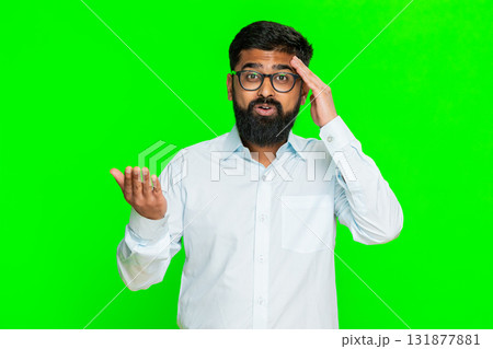 Indian man touching forehead surprised remembering something with shocked expression realization 131877881