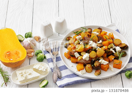 roasted autumn vegetable salad and feta cheese 131878486