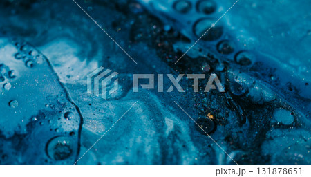Sparkling bubbles. Paint background. Defocused blue color marble shimmer water round soapy oil texture flowing on acrylic art abstraction. Sparkling bubbles. Paint background. Defocused blue color marble shimmer water round soapy oil texture flowing on acrylic art abstraction. 131878651