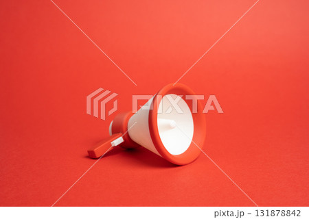 Red megaphone on a red background. Breaking news. Urgent announcement. Mass communication, alert, attention. Media, PR, marketing campaigns, crisis communication topics. Urgency and information impact Red megaphone on a red background. Breaking news. Urgent announcement. Mass communication, alert, attention. Media, PR, marketing campaigns, crisis communication topics. Urgency and information impact 131878842