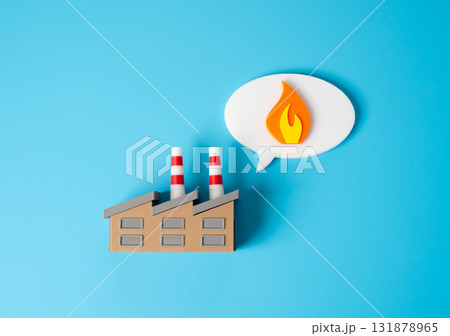 Factory fire. Contract workforce at full capacity. Economic activity and industrial production up. Symbol of industrial risks, production intensity, and business resilience. Manufacturing safety 131878965