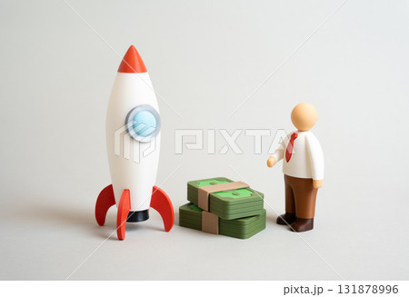 A businessman invests money in launching a promising startup. Symbol of entrepreneurship, innovation. Venture capital, business growth, and investment opportunities. 131878996
