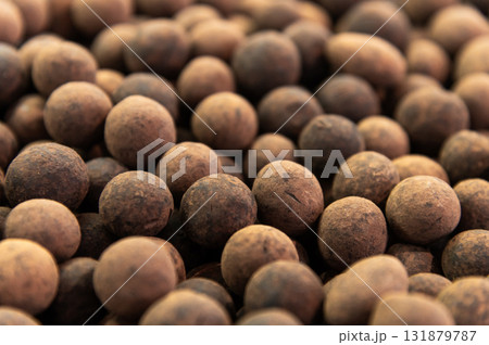 Chocolate-covered nuts. Lots of delicious treats on the store shelves. 131879787