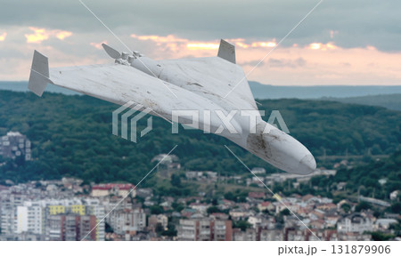 A drone in the sky above a megalopolis. Top view of the city landscape. 131879906