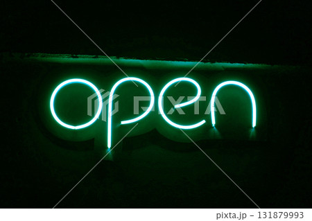 Green neon night plate with inscription Open 131879993