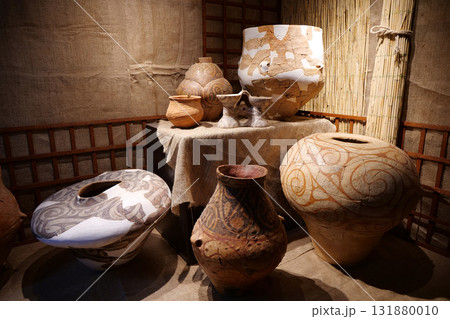 Real ancient pottery glued together from separate fragments Real ancient pottery glued together from separate fragments 131880010