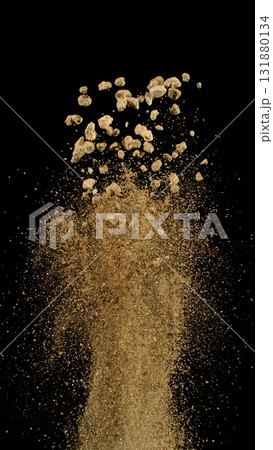 Freeze Motion Shot of Flying Soil , Isolated on Black Background Freeze Motion Shot of Flying Soil , Isolated on Black Background 131880134