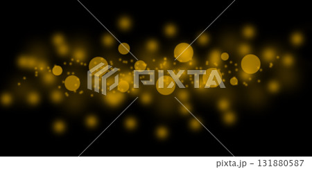 Golden bokeh lights drift across a dark background, creating a warm, festive, cinematic atmosphere 131880587