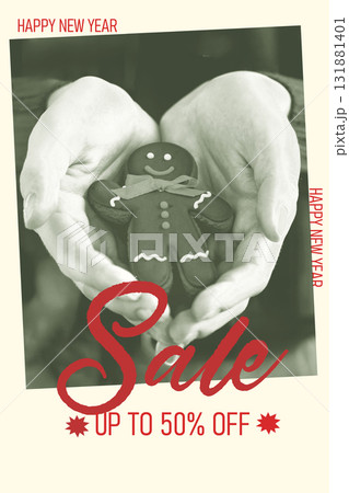 Gingerbread cookie in hands celebrating New Year with special sale offer 131881401