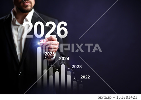 Business professional demonstrates growth trends with graph from 2022 to 2026 Business professional demonstrates growth trends with graph from 2022 to 2026 131881423