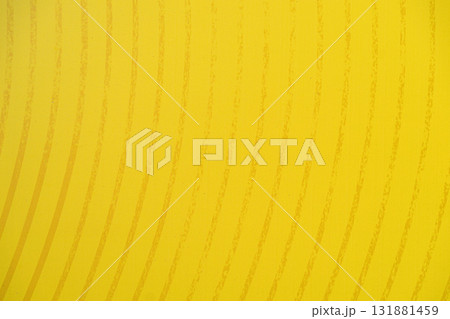 Yellow wall with curved gradient lines creating a bright abstract pattern. Concept of color, simplicity, and modern minimal design. Natural background, copy space Yellow wall with curved gradient lines creating a bright abstract pattern. Concept of color, simplicity, and modern minimal design. Natural background, copy space 131881459