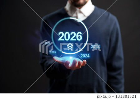 Future projections in digital display held in a hand for planning and forecasting Future projections in digital display held in a hand for planning and forecasting 131881521