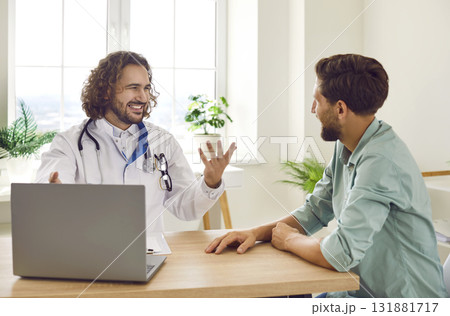 Young man patient visiting a doctor at the medical office during medical examination. 131881717
