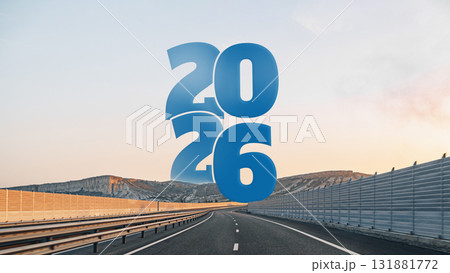 Years 2026 and 2026 sign on an empty highway under a clear sky at sunset 131881772
