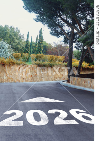 Direction toward future events marked on a winding road in a scenic landscape Direction toward future events marked on a winding road in a scenic landscape 131881836