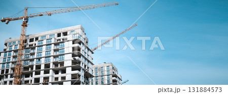Construction crane in the construction of multi-storey buildings. High quality photo 131884573