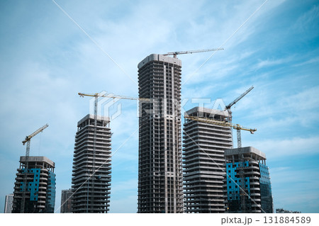 Construction of multi-storey buildings. High quality photo Construction of multi-storey buildings. High quality photo 131884589