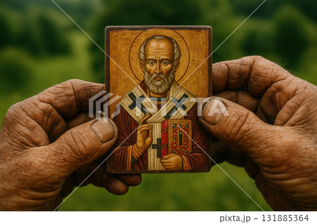 Weathered hands holding a painted religious icon of a bearded saint with a golden halo, set against a lush green natural background, AI Generative Weathered hands holding a painted religious icon of a bearded saint with a golden halo, set against a lush green natural background, AI Generative 131885364
