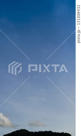 Vertical view of nature silhouette dark mountain up to the sky in evening. Free space for general use for insert concept subject. 131886432