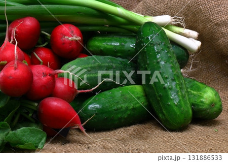 Fresh vegetables radish cucumber tomatoes 131886533