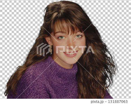 Young girl with long brown hair purple sweater smiling with earring, cheerful portrait with natural freckles and soft lighting 131887063