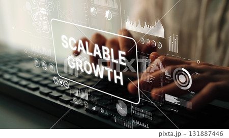 Futuristic Business Growth Concept with Scalable Growth Text Overlaid on Hands Typing on Laptop Keyboard. Asymptotic smart data analytic Futuristic Business Growth Concept with Scalable Growth Text Overlaid on Hands Typing on Laptop Keyboard. Asymptotic smart data analytic 131887446