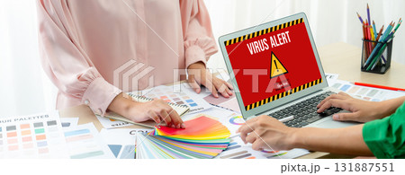 Virus warning alert on computer screen detected brisk cyber threat Virus warning alert on computer screen detected brisk cyber threat 131887551