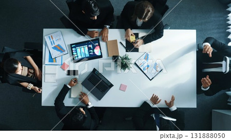 Top view of manager use VR set to enter virtual world at meeting. Directorate. Top view of manager use VR set to enter virtual world at meeting. Directorate. 131888050