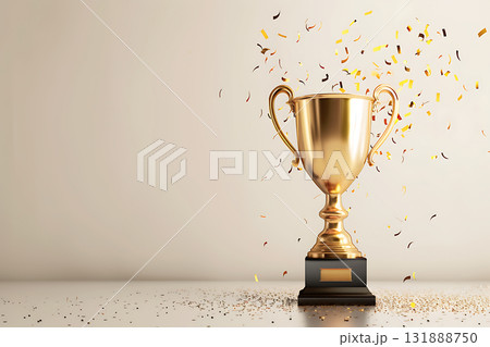 金色のトロフィーと紙吹雪が舞う祝賀イメージ（受賞・成功・栄光） 131888750