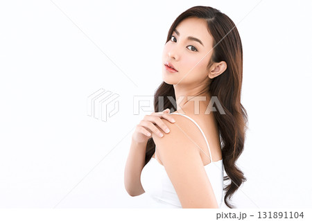 A beautiful young Asian woman with clean, fresh skin against a white background. Skincare, facial treatment, cosmetology, beauty, and spa. An elegant portrait of an Asian woman. A beautiful young Asian woman with clean, fresh skin against a white background. Skincare, facial treatment, cosmetology, beauty, and spa. An elegant portrait of an Asian woman. 131891104