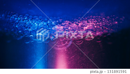 Neon bubbles. Soapy balls. Defocused blue purple color gradient round water bright texture on abstract ultraviolet light background. Neon bubbles. Soapy balls. Defocused blue purple color gradient round water bright texture on abstract ultraviolet light background. 131891591